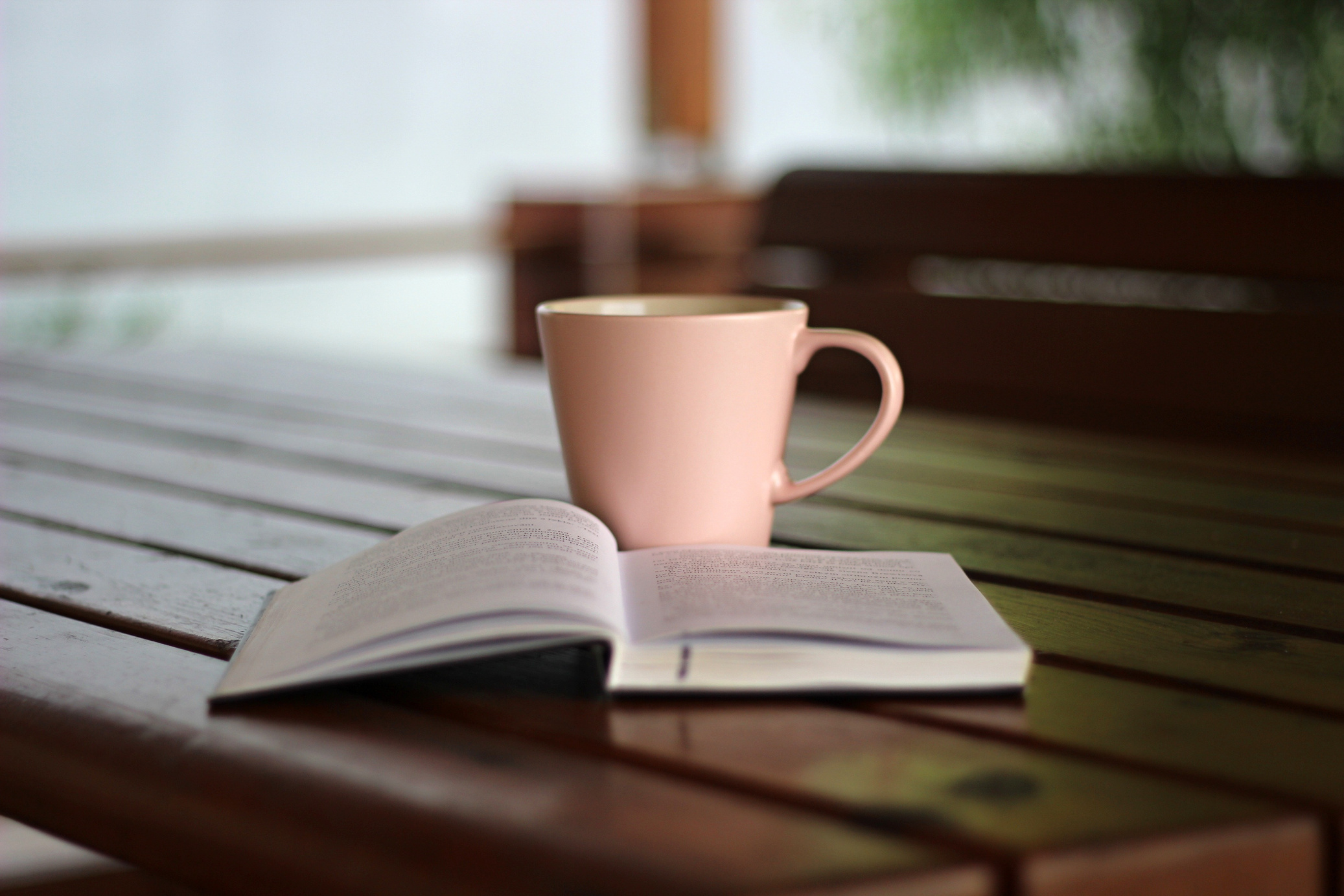 Mug and Notebook on a Table